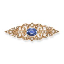 A SAPPHIRE AND DIAMOND BROOCH in 9ct yellow gold, the openwork brooch set with an oval cut sapphi...