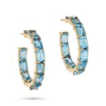 A PAIR OF BLUE TOPAZ HOOP EARRINGS in 14ct yellow gold, each set with rectangular step cut blue t...