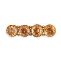 AN ANTIQUE TOPAZ BAR BROOCH in yellow gold, set with a row of four round cut foiled orange topaz,...