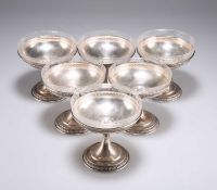 A SET OF SIX AMERICAN STERLING SILVER GLASS-LINED ICE CREAM DESSERT DISHES