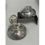 A PAIR OF VICTORIAN SILVER-MOUNTED GLASS INKWELLS