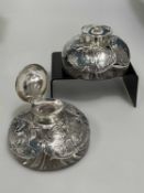 A PAIR OF VICTORIAN SILVER-MOUNTED GLASS INKWELLS