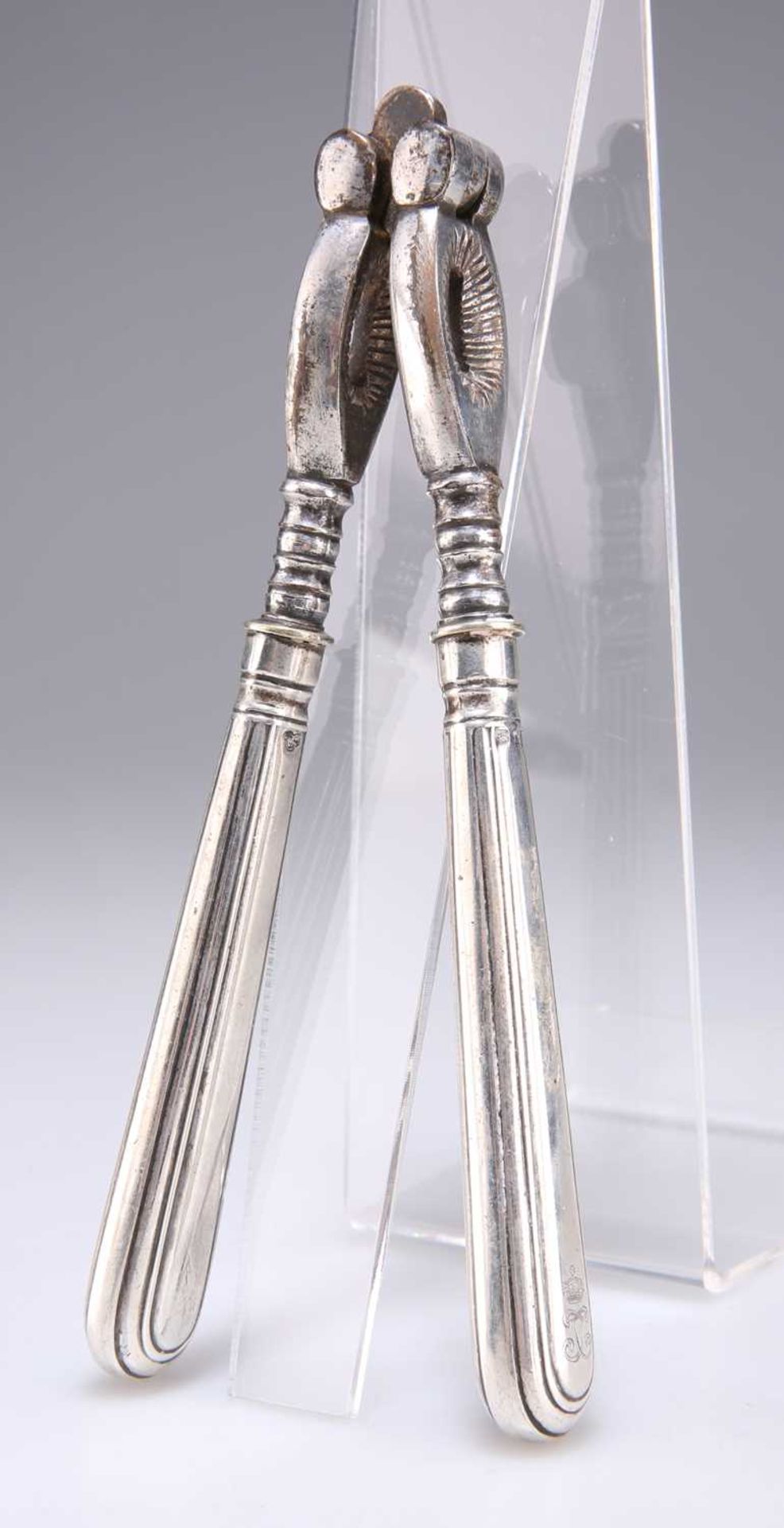 A PAIR OF GEORGE VI SILVER-HANDLED NUT CRACKERS