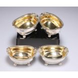 A SET OF FOUR GEORGE III SILVER OPEN SALTS