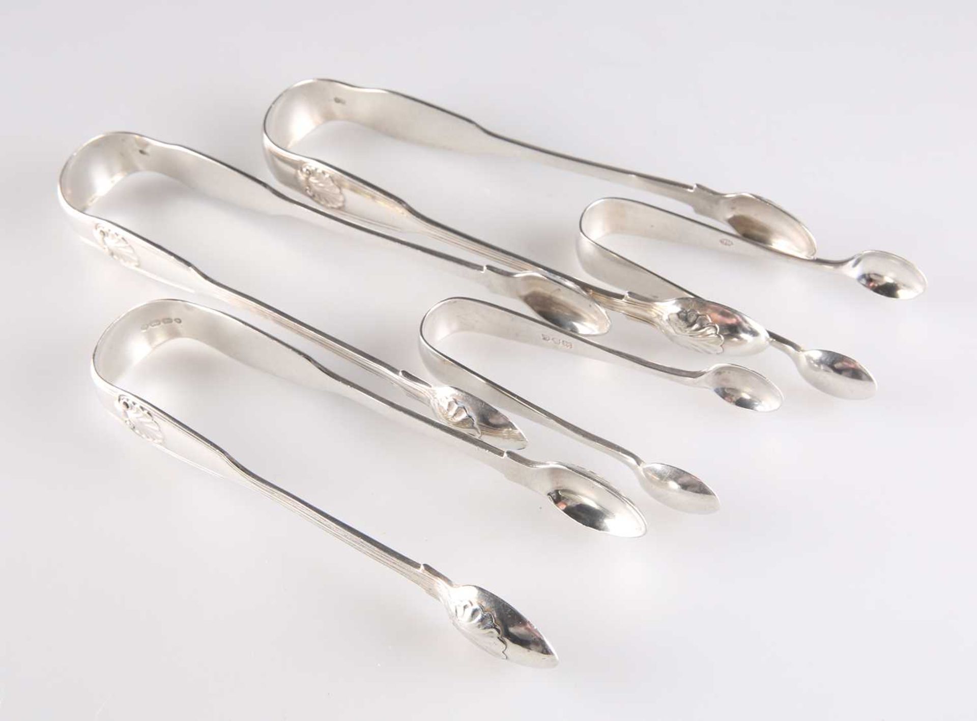 † FIVE PAIRS OF SILVER SUGAR NIPS, VICTORIAN AND LATER