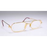 CARTIER: A PAIR OF GOLD-PLATED MUST DE CARTIER LOUIS CARTIER PRESCRIPTION GLASSES, CIRCA 1980S