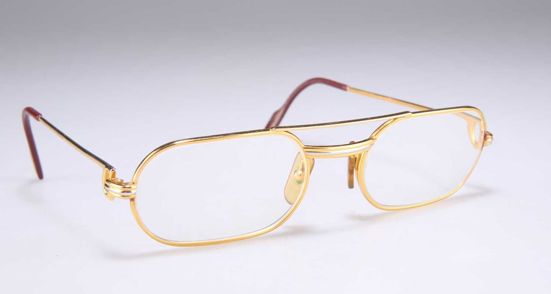 CARTIER: A PAIR OF GOLD-PLATED MUST DE CARTIER LOUIS CARTIER PRESCRIPTION GLASSES, CIRCA 1980S