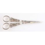 A PAIR OF GEORGE III SILVER KING'S HONEYSUCKLE PATTERN GRAPE SHEARS