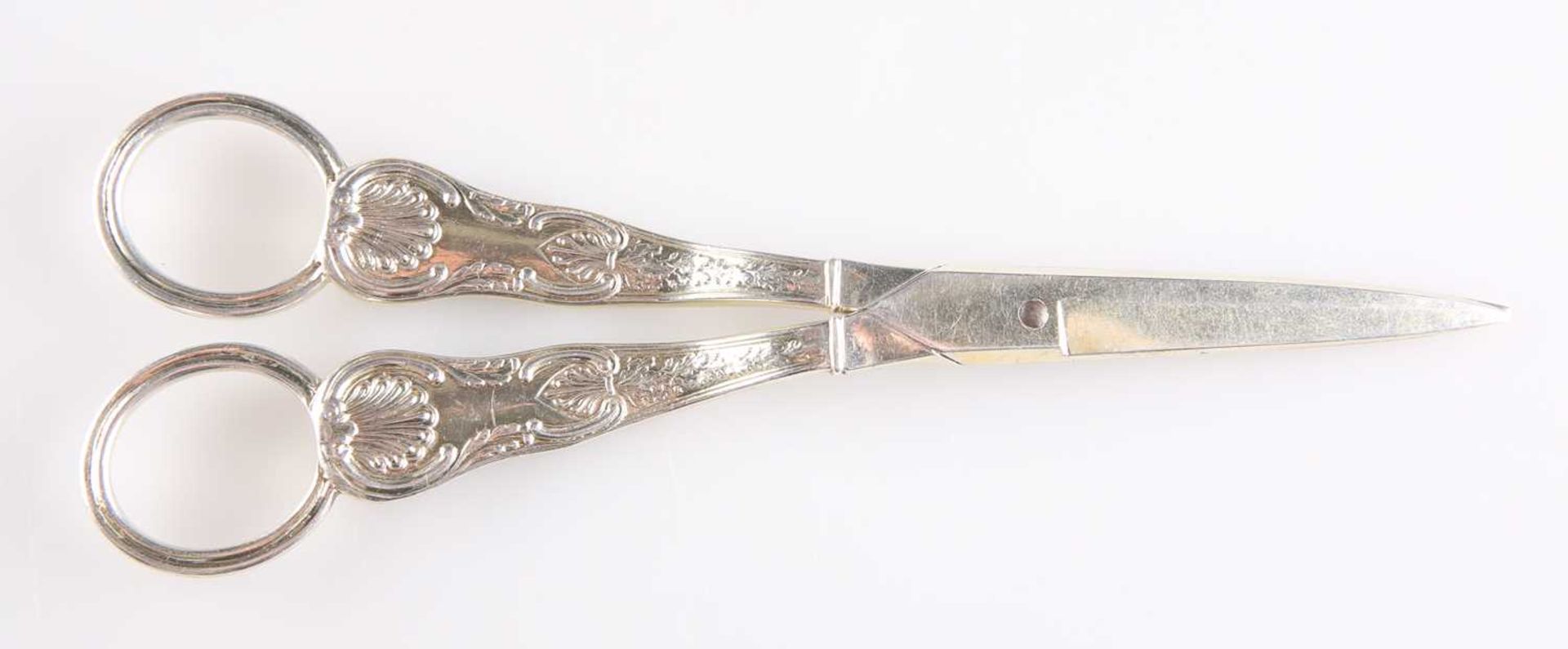A PAIR OF GEORGE III SILVER KING'S HONEYSUCKLE PATTERN GRAPE SHEARS