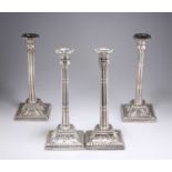 A SET OF FOUR GEORGE III SILVER TABLE CANDLESTICKS