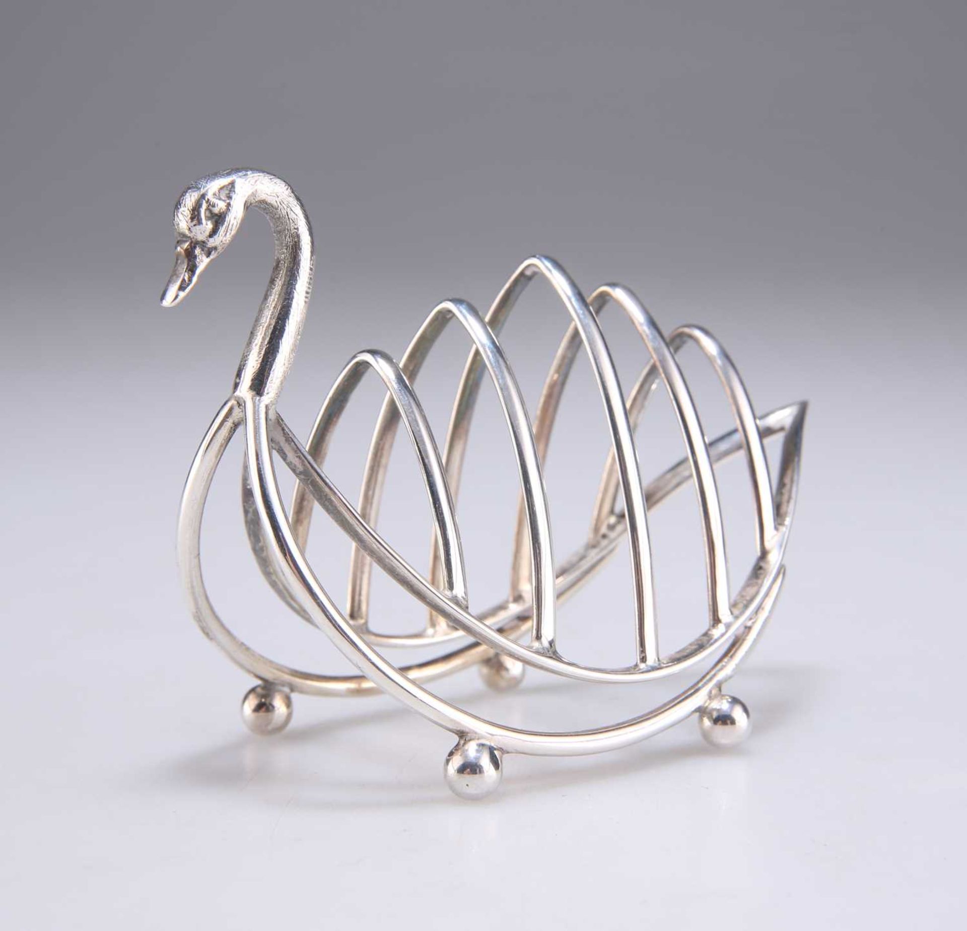 A GEORGE V NOVELTY SILVER SWAN TOAST RACK