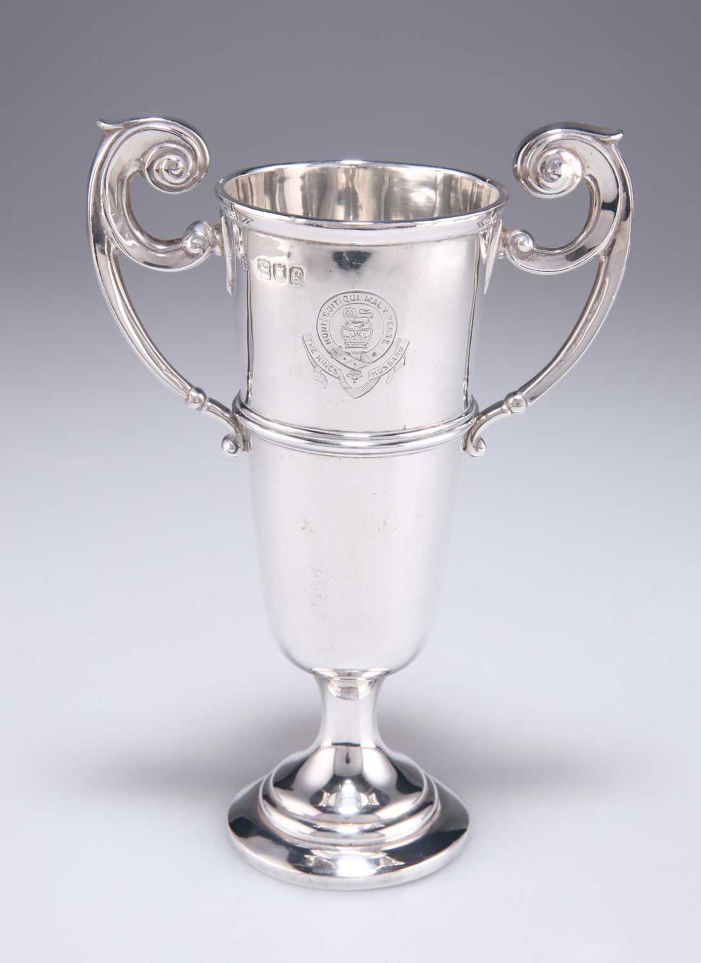 † AN EDWARDIAN SILVER TROPHY CUP