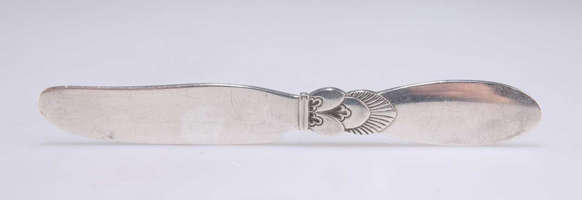 GEORG JENSEN: A DANISH STERLING SILVER CACTUS PATTERN BUTTER KNIFE - Image 2 of 2