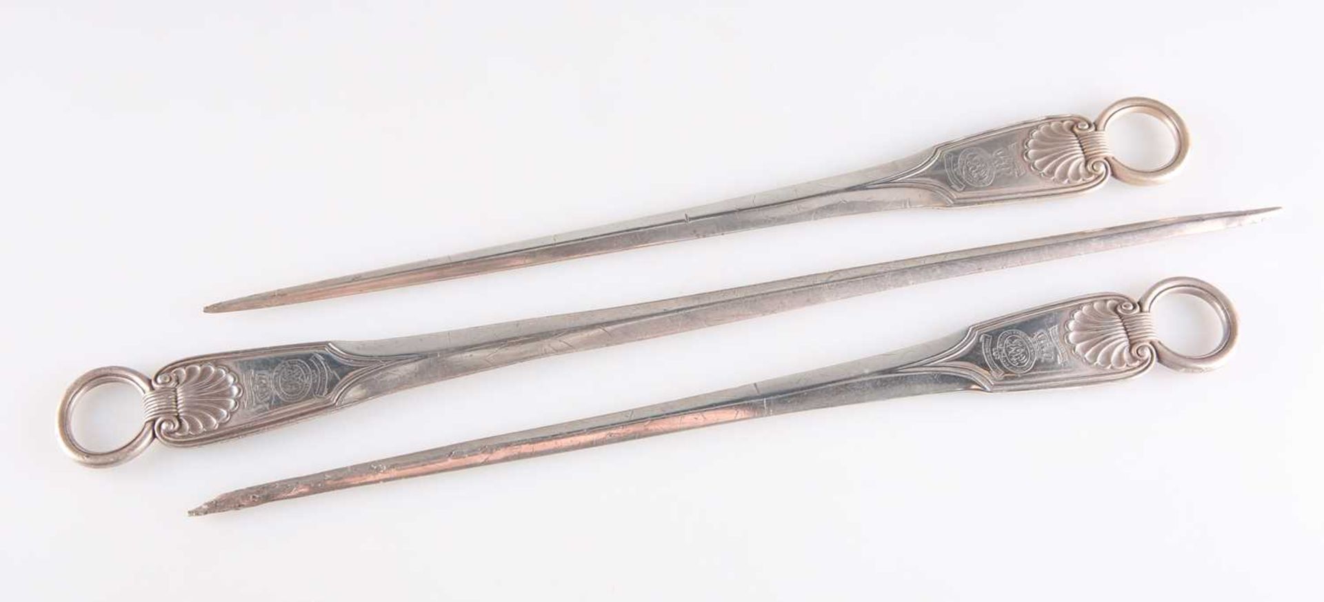 † THREE VICTORIAN SILVER MEAT SKEWERS