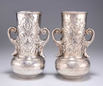 A PAIR OF 19TH CENTURY TWIN-HANDLED VASES
