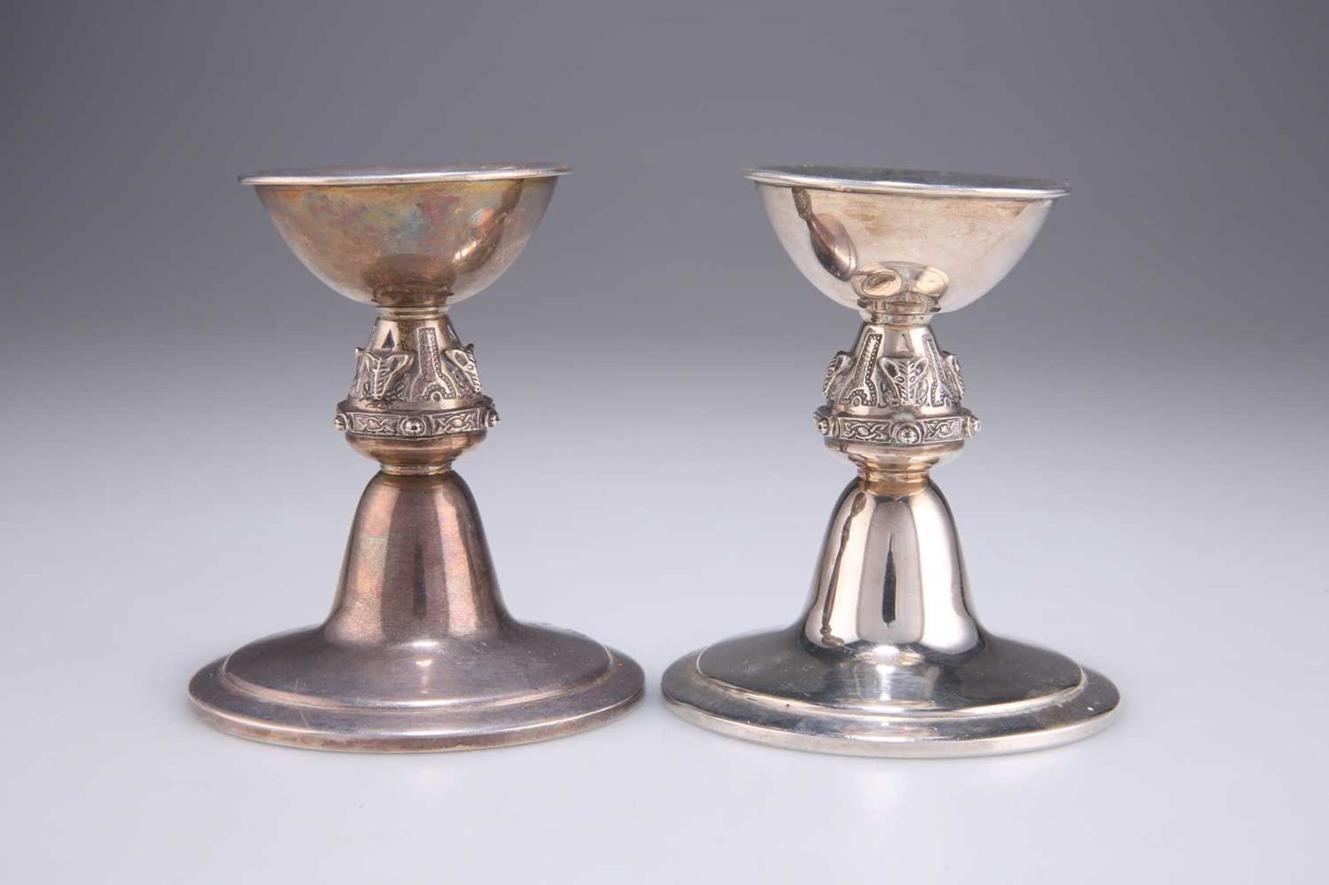 A PAIR OF ELIZABETH II SILVER CANDLESTICKS