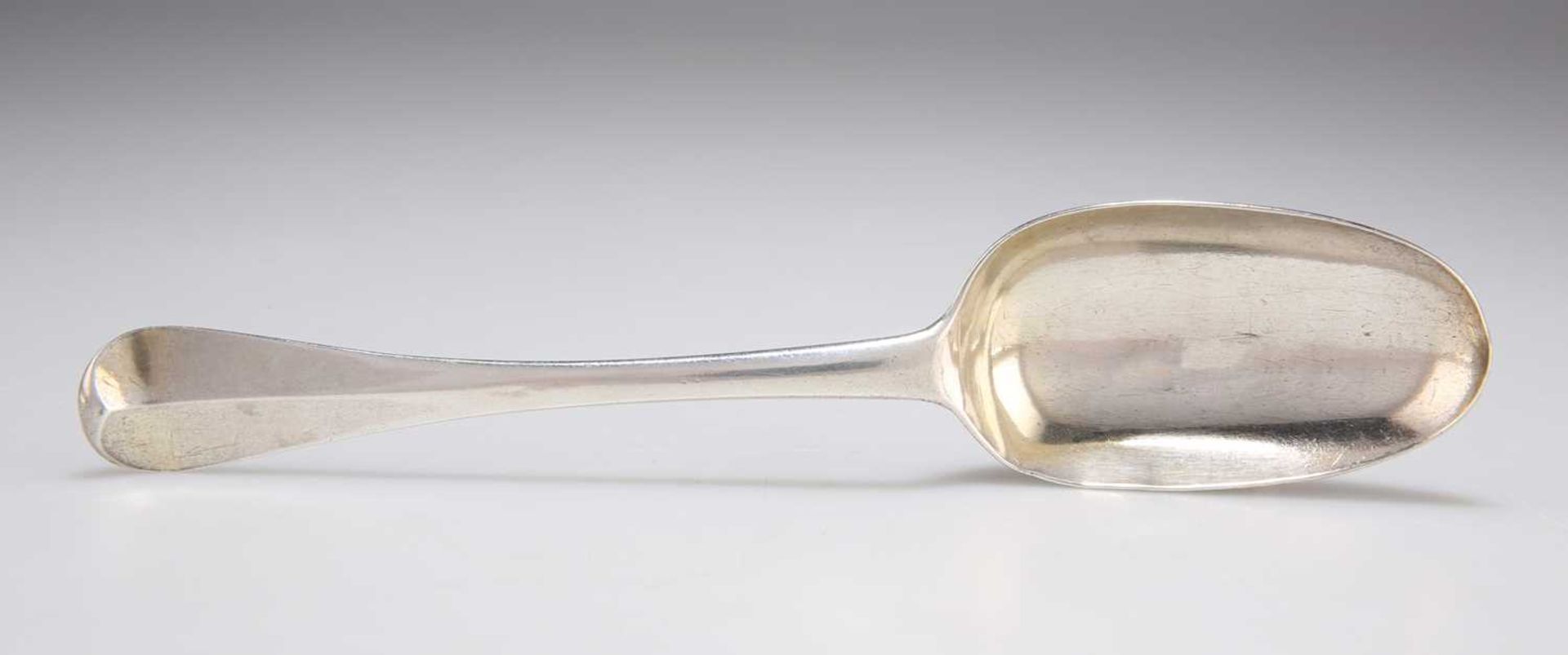 A GEORGE I BRITANNIA SILVER HANOVERIAN PATTERN TABLESPOON