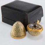 STUART DEVLIN: AN ELIZABETH II SILVER-GILT SURPRISE EGG