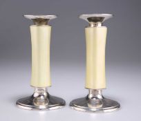 A PAIR OF SWISS STERLING SILVER AND ENAMEL CANDLESTICKS
