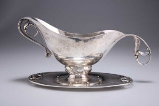 A GEORG JENSEN STERLING SILVER SAUCEBOAT, STAND AND LADLE