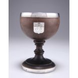 AN 18TH CENTURY SILVER-MOUNTED TREEN COCONUT CUP