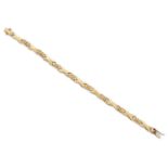 A 9 CARAT GOLD FANCY LINK BRACELET