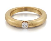 CARTIER - AN 18 CARAT GOLD ELLIPSE SOLITAIRE DIAMOND RING