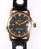 A GOLD PLATED OMEGA SEAMASTER CALENDAR STRAP WATCH