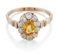 A LATE 19TH CENTURY YELLOW SAPPHIRE AND DIAMOND CLUSTER RING