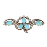 AN EARLY 20TH CENTURY TURQUOISE AND DIAMOND BROOCH