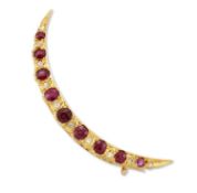 A LATE 19TH CENTURY RUBY AND DIAMOND CRESCENT BROOCH
