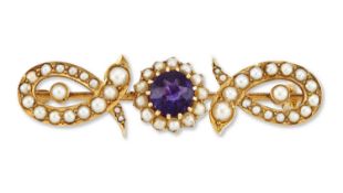 A LATE 19TH CENTURY AMETHYST AND SEED PEARL BROOCH