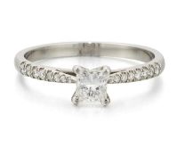 A PLATINUM SOLITAIRE PRINCESS-CUT DIAMOND RING