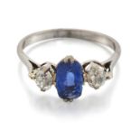 A SAPPHIRE AND DIAMOND THREE STONE RING