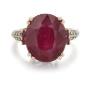 A 9 CARAT GOLD RUBY AND DIAMOND RING