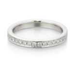 A PLATINUM DIAMOND HALF HOOP RING