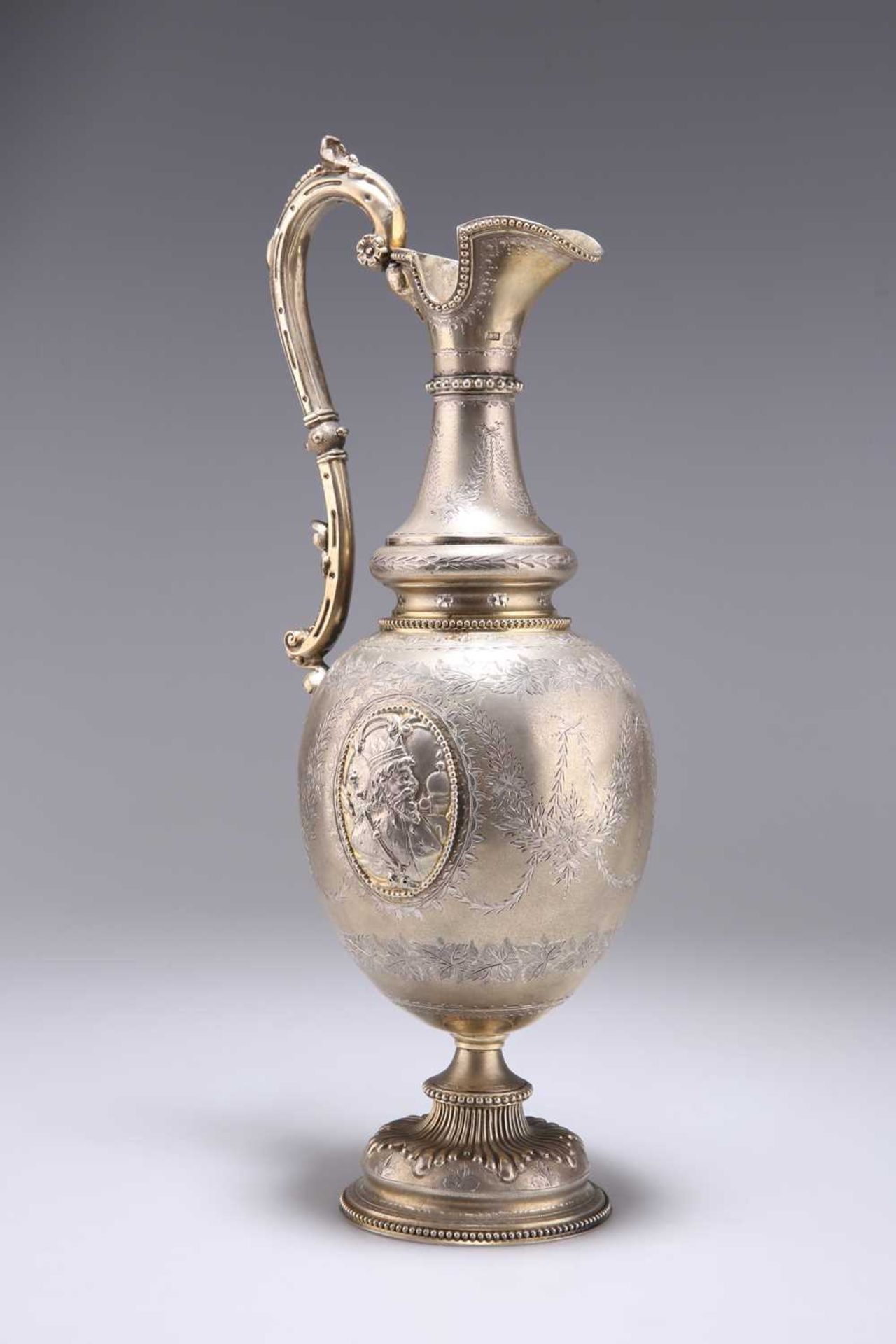 A FINE VICTORIAN SILVER-GILT EWER