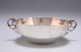 AN 18TH CENTURY SILVER TWO-HANDLED BOWL