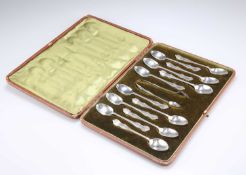 A SET OF TWELVE EDWARDIAN SILVER TEASPOONS AND A PAIR OF SUGAR TONGS