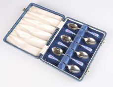 A SET OF SIX GEORGE V SILVER AND ENAMEL COFFEE SPOONS