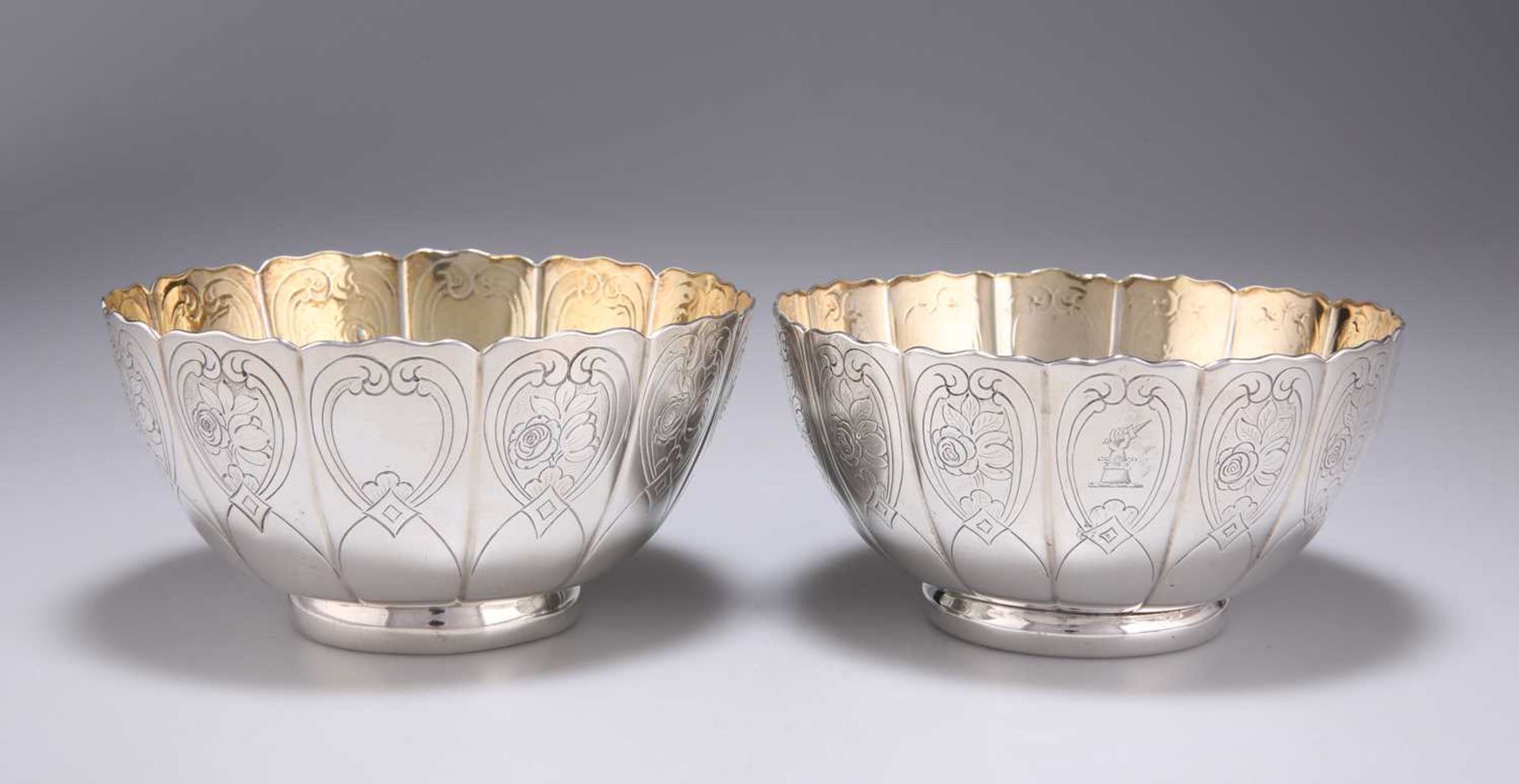 A NEAR-PAIR OF VICTORIAN SILVER BOWLS