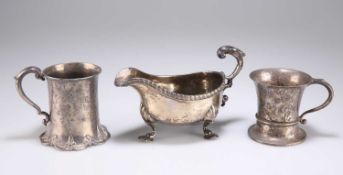 A GEORGIAN SILVER SAUCEBOAT, TOGETHER WITH TWO SILVER MUGS