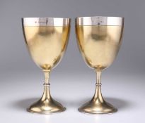 A LARGE PAIR OF VICTORIAN SILVER-GILT GOBLETS