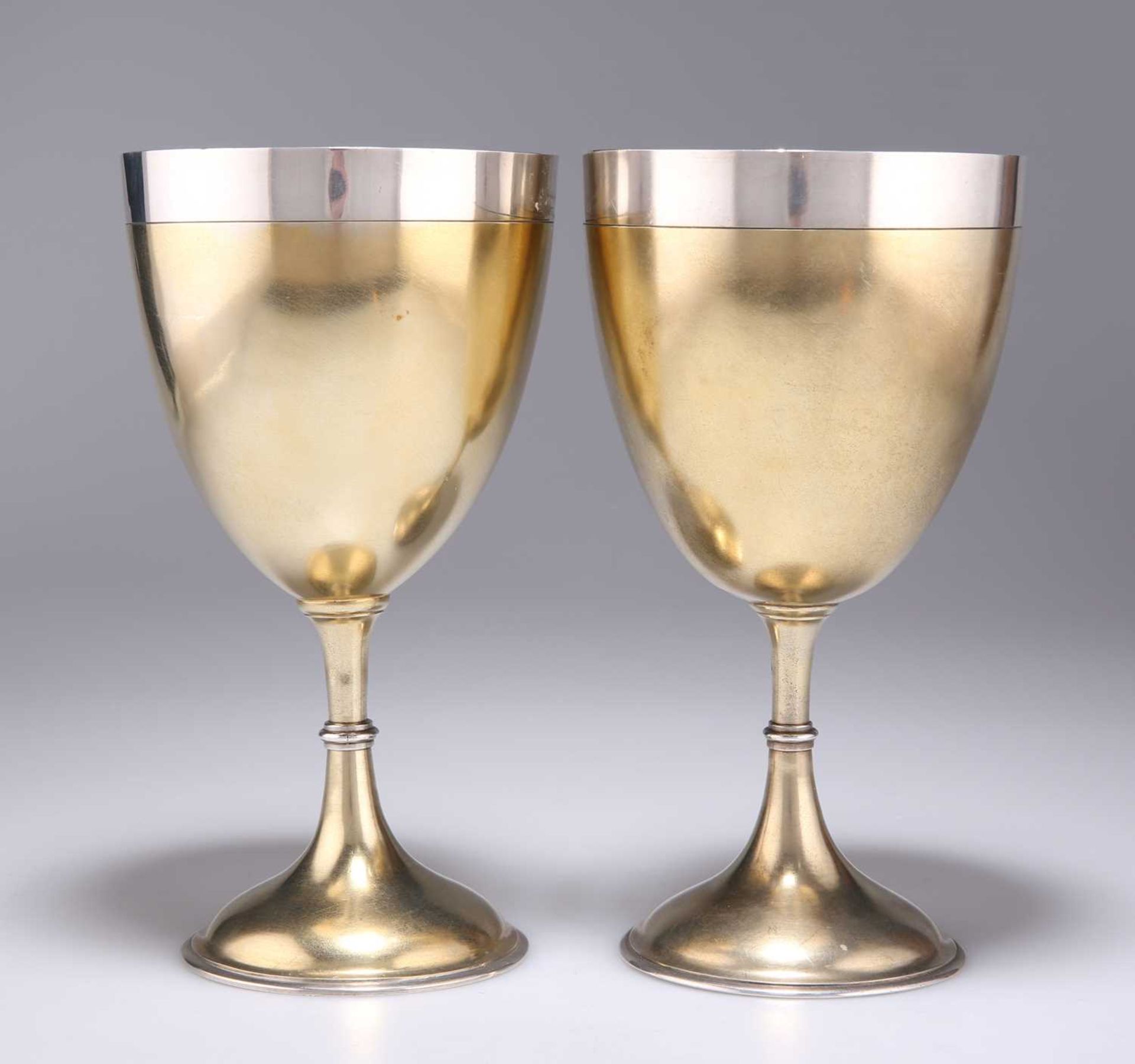 A LARGE PAIR OF VICTORIAN SILVER-GILT GOBLETS - Image 2 of 3