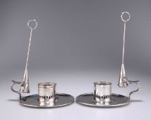 A PAIR OF 19TH CENTURY SILVER PLATED CHAMBERSTICKS