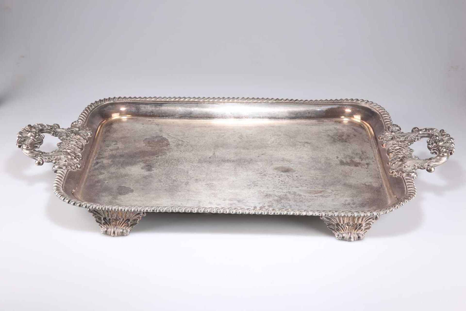 A VICTORIAN LARGE SILVER-PLATED TWO-HANDLED TRAY
