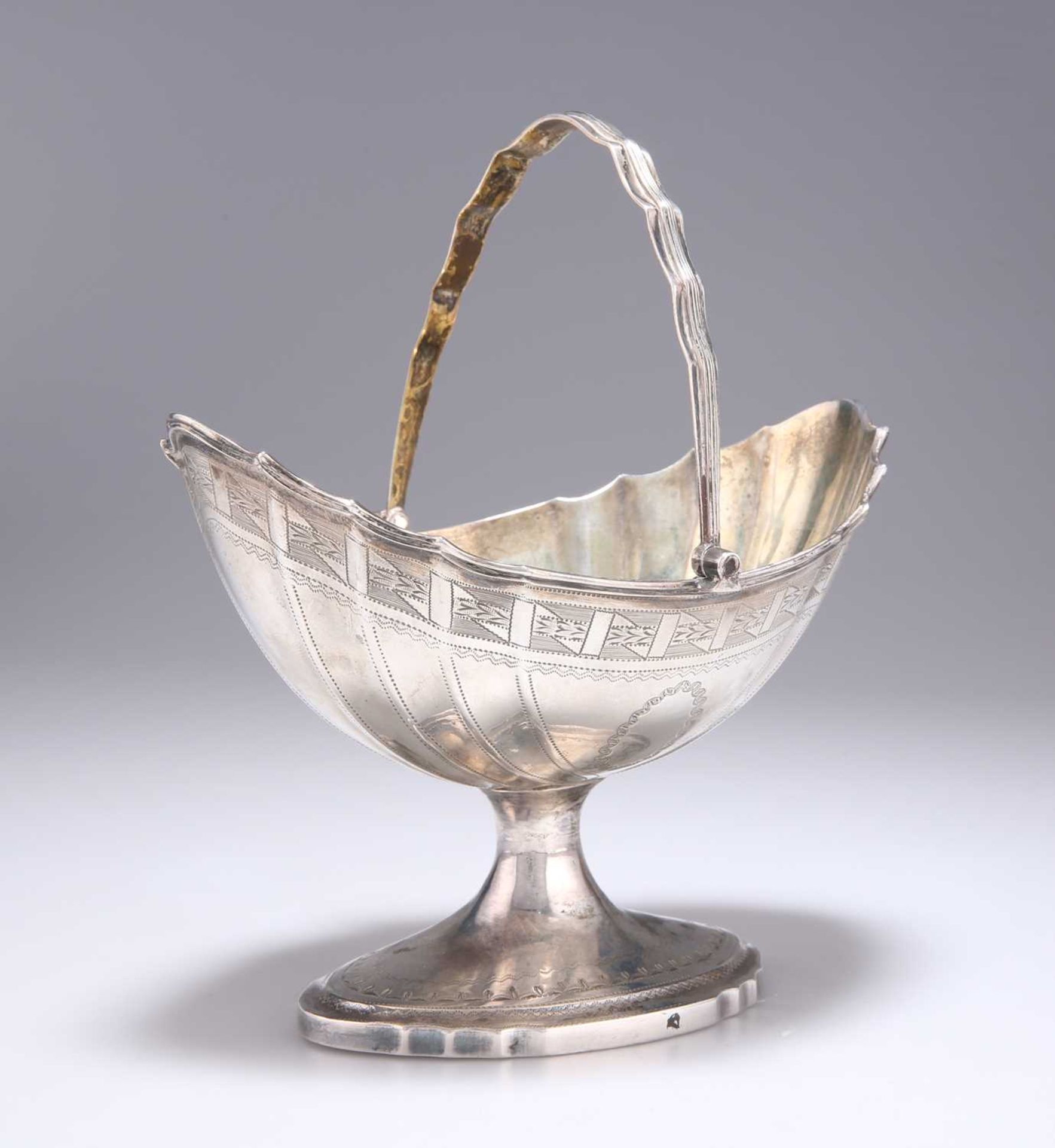 A GEORGE III IRISH SILVER SUGAR BASKET