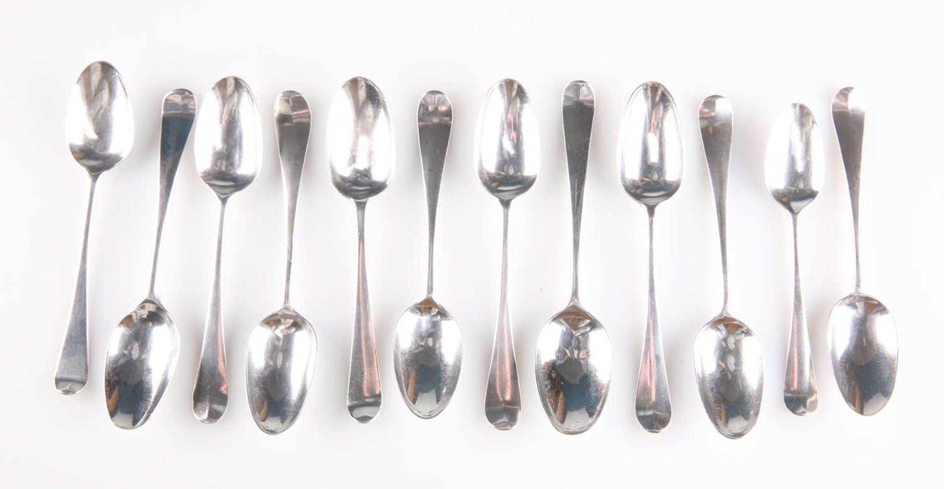 TWELVE SILVER HANOVERIAN PATTERN PICTURE-BACK TEASPOONS, 18TH CENTURY