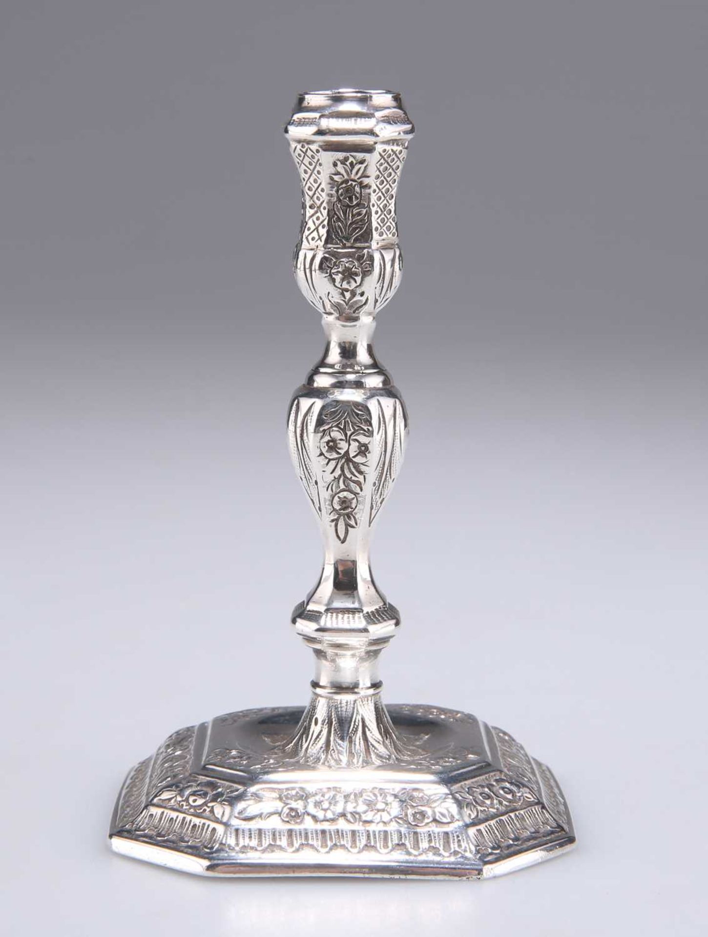 A GEORGE I BRITANNIA STANDARD SILVER TAPERSTICK