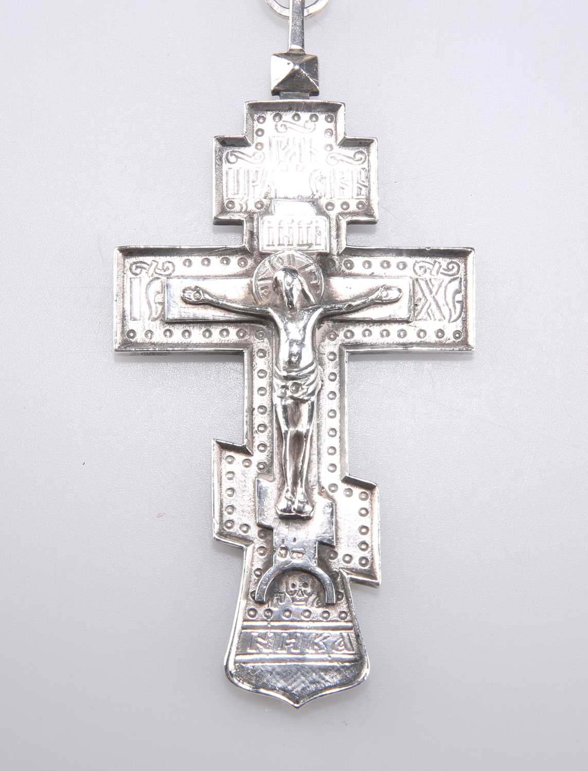 A 19TH CENTURY RUSSIAN SILVER ORTHODOX CRUCIFIX PENDANT ON CHAIN